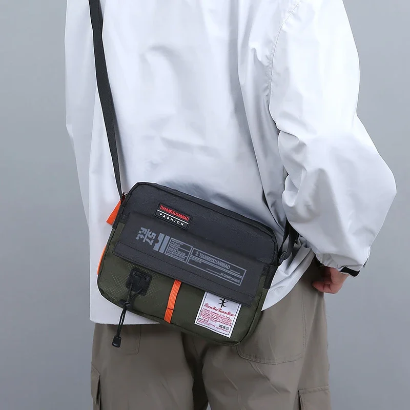 The New Single Shoulder Bag Outside The Casual Crossbody Bag Fashion Hand Nylon Color Bag for Men and Women