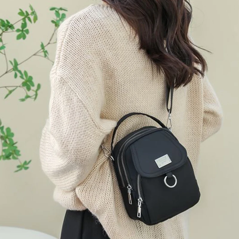 Neutraler Rucksack für Männer und Frauen, geeignet für Reisen und Fotografie, mehrschichtige Tasche, Umhängetasche – Detail 9