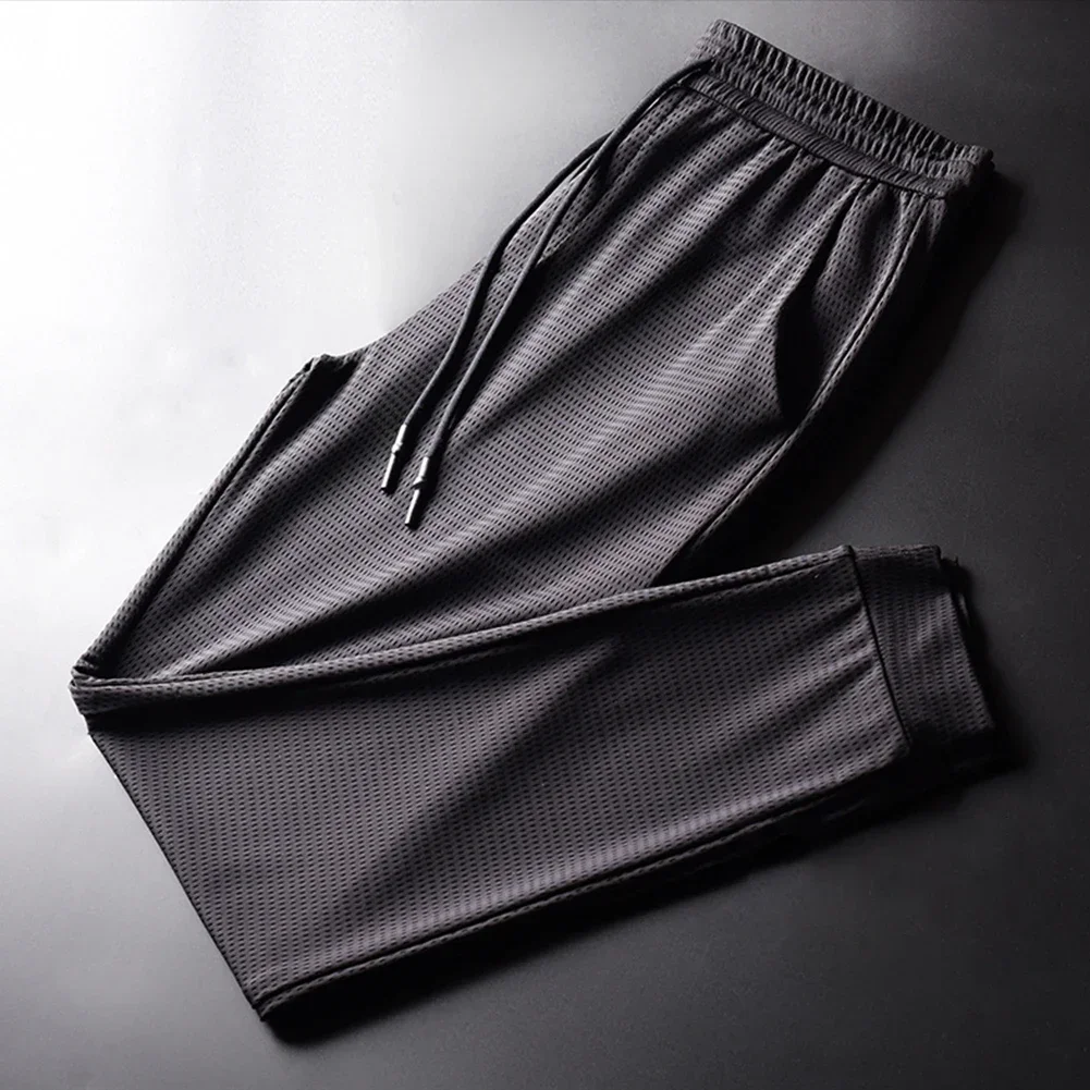 

Men's Summer Ice Silk Sports Pants Quick-Dry Breathable Thin Fitness Loose Mesh Trousers Stretch Pocket Straight Mens Pants