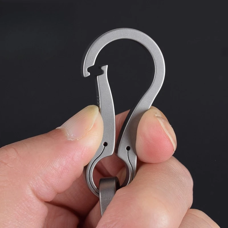 سلسلة مفاتيح جديدة من سبائك التيتانيوم، سلسلة مفاتيح صغيرة مطورة على شكل قطرة الماء، عالية الجودة، متكاملة سريعة التعليق