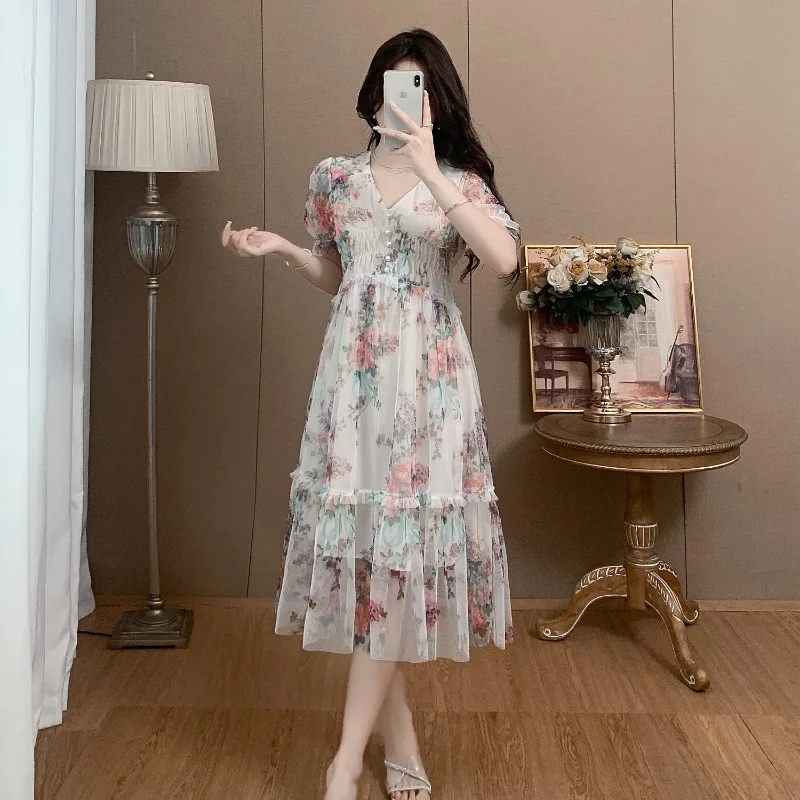 Robe de luxe en gaze imprimée pour femmes, tenue amincissante, mi-longue, tempérament, été, 2025