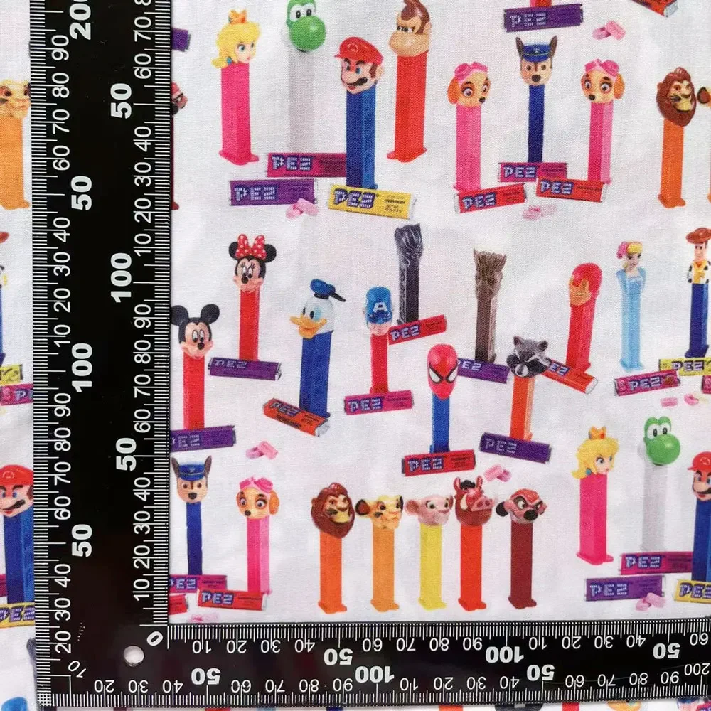 Tela disney de 140x50CM, tela de algodón de dibujos animados, tejido de retales, textil para el hogar para niños, costura de muñeca, vestido, cortina, tela de algodón de poliéster