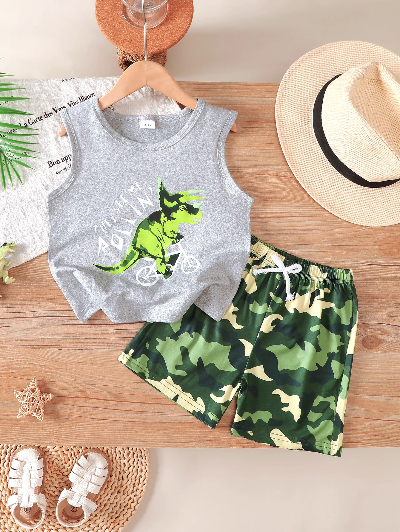 Summer Boys' Dinosaur Sleeveless Vest and Camouflage Shorts Two-Piece Set for Young Children, Stylish Cartoon Dinosaur Print Casual Outfit, Suitable for Sports, Home, and Outdoor Activities, Fashionable and Cool, Lightweight Versatile Trendy Children's Clothing