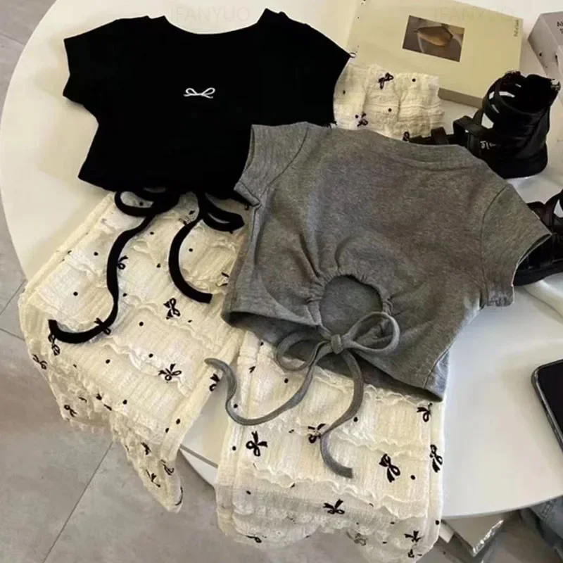 Camiseta de algodón de manga corta con estampado de lazo para niña pequeña, camiseta con cordón, Top informal, ropa de verano para bebé de 1 a 10 años