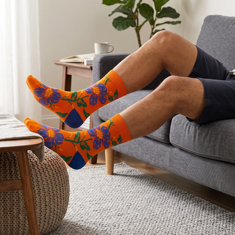 1 Pair of Unisex Socks with Orange Base, Blue-Purple Large Floral Patterns, Green Leaves, and Yellow Accents, Blue Sock Tips, Orange Ribbed Sock Cuffs and Heels, Mid-Calf Length, Sweat-Absorbent and Breathable, Fresh and Lively Fashion Socks, Suitable for Daily Wear, Couple Mid-Calf Socks