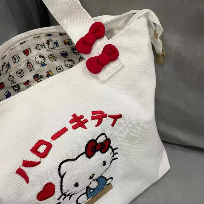 Miniso Hellokitty śliczne płócienne torby na ramię Cartoon haftowane białe torebki Zipper Casual Bookbags Y2k torebki dla dziewczynek