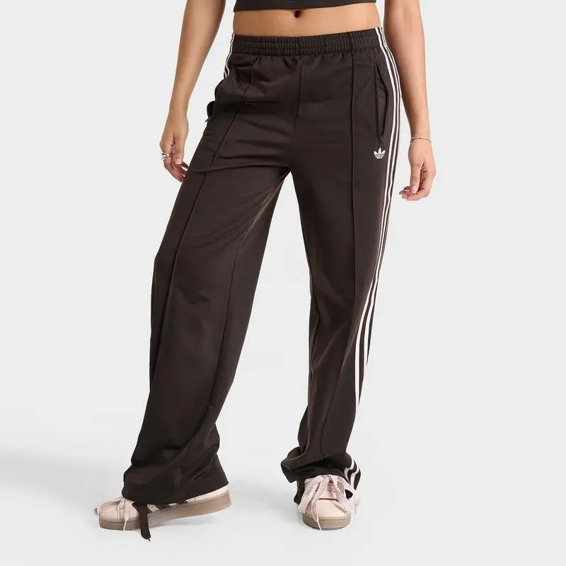 adidas | Pantalones deportivos holgados adidas Originals Firebird para mujer