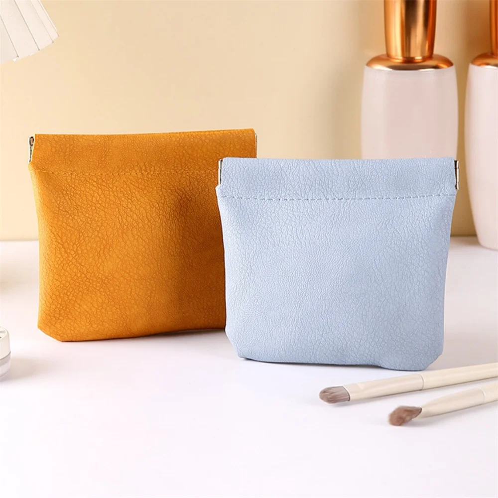 Mini bolsas de cosméticos de joyería de lápiz labial para mujer, bolsa de almacenamiento de maquillaje de cierre automático portátil, bolso de mano de cuero PU para auriculares y monedas