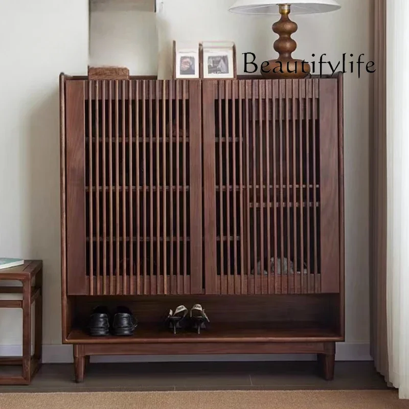 

North American black walnut grille shoe cabinet large capacity porch cabinet Nordic small apartment solid wood shoe rack