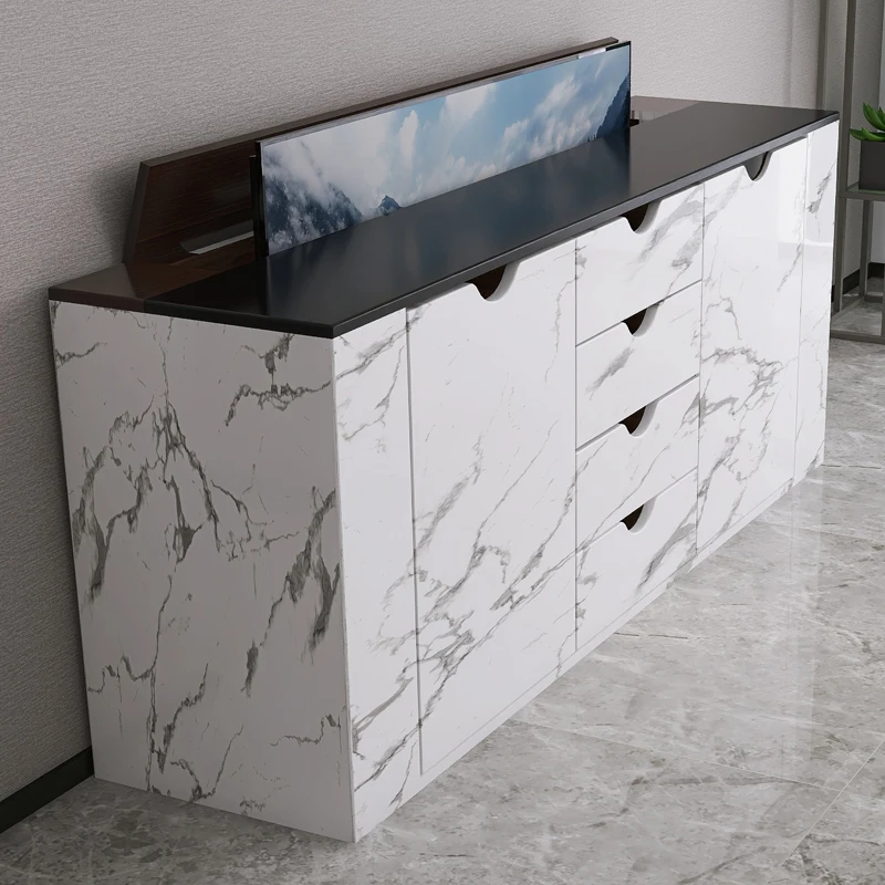 

Floor-to-ceiling TV cabinet lifts and lowers the hidden TV