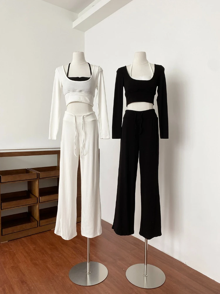 

Весенний новый комплект в корейском стиле: женский комплект из двух предметов, имитация двухслойной футболки с длинными рукавами + брюки с высокой талией и завязками, повседневные брюки.