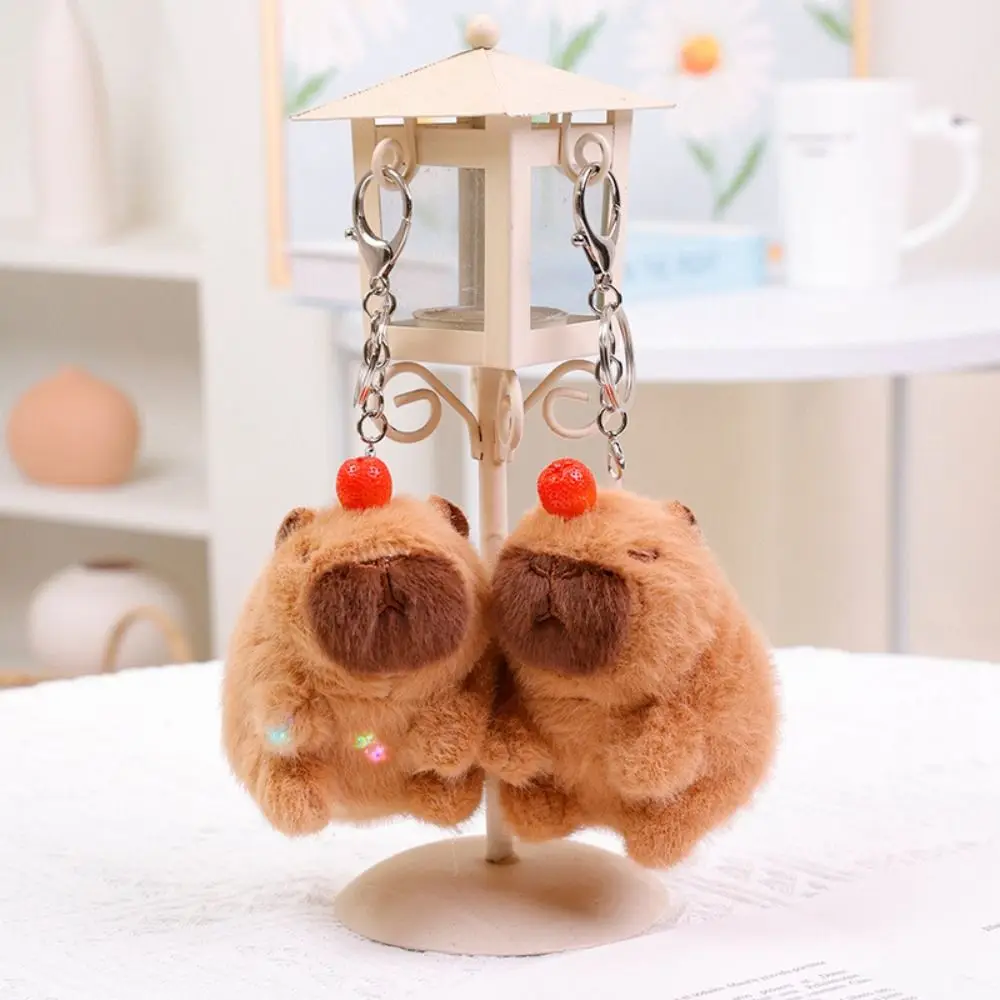 Kawaii Luminous Plush Capybara Keychain PP Cotton Wagging Tail Cartoon Couple Pendant Music Doll Capybara Keyring Bag Ornaments