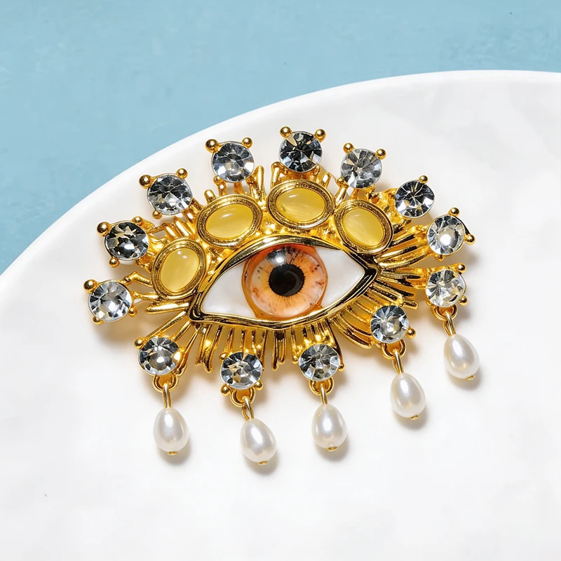 Wuli&baby Charming Blue Eye Brooches For Women Unisex Rhinestone Pearl Eyes Party Office Brooches Pins Gifts