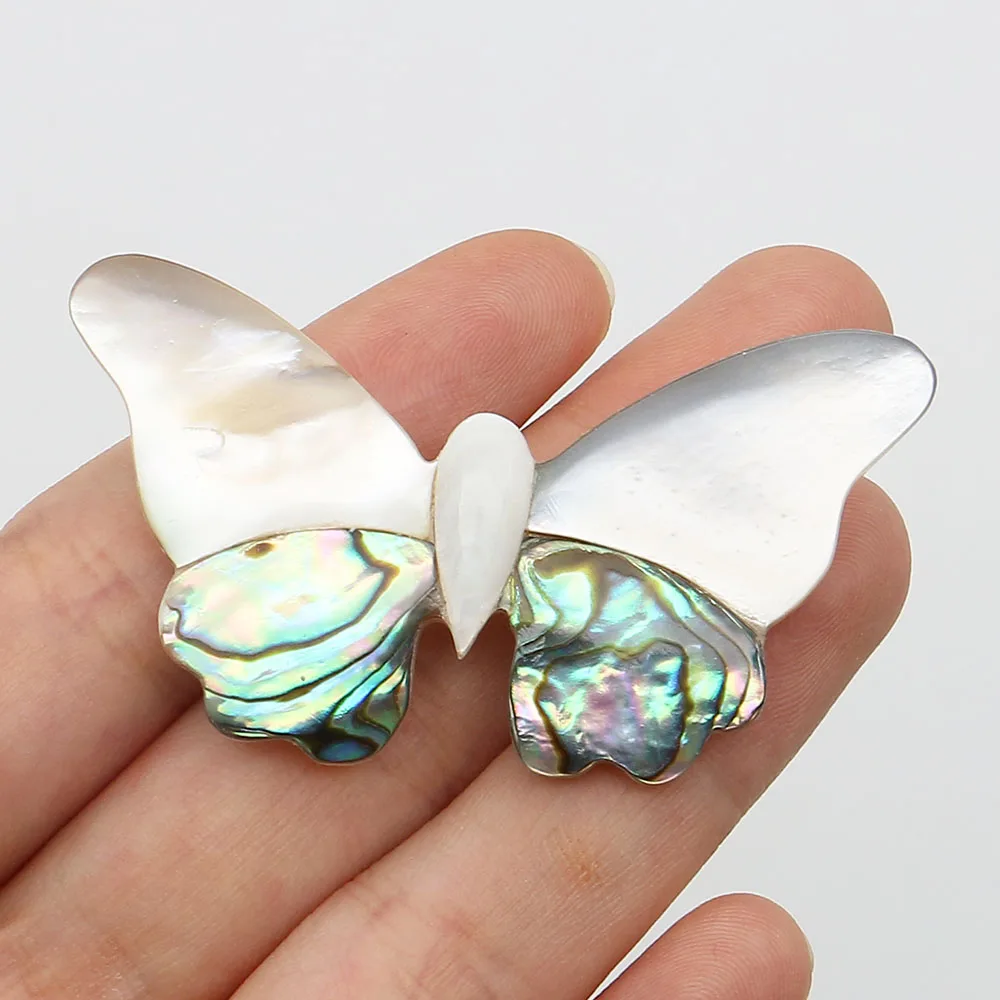 

Брошь в форме бабочки из натуральной морской ракушки абалона 54x30 мм, креативная, с декоративной вышивкой, для женщин, для ношения на вечеринках или в качестве подарка.