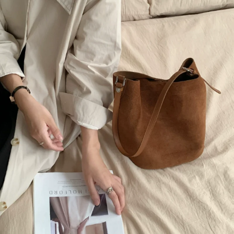 Retro style commuting leather women bag 2026 new frosted cowhide bucket bag women high-end single shoulder crossbody bag