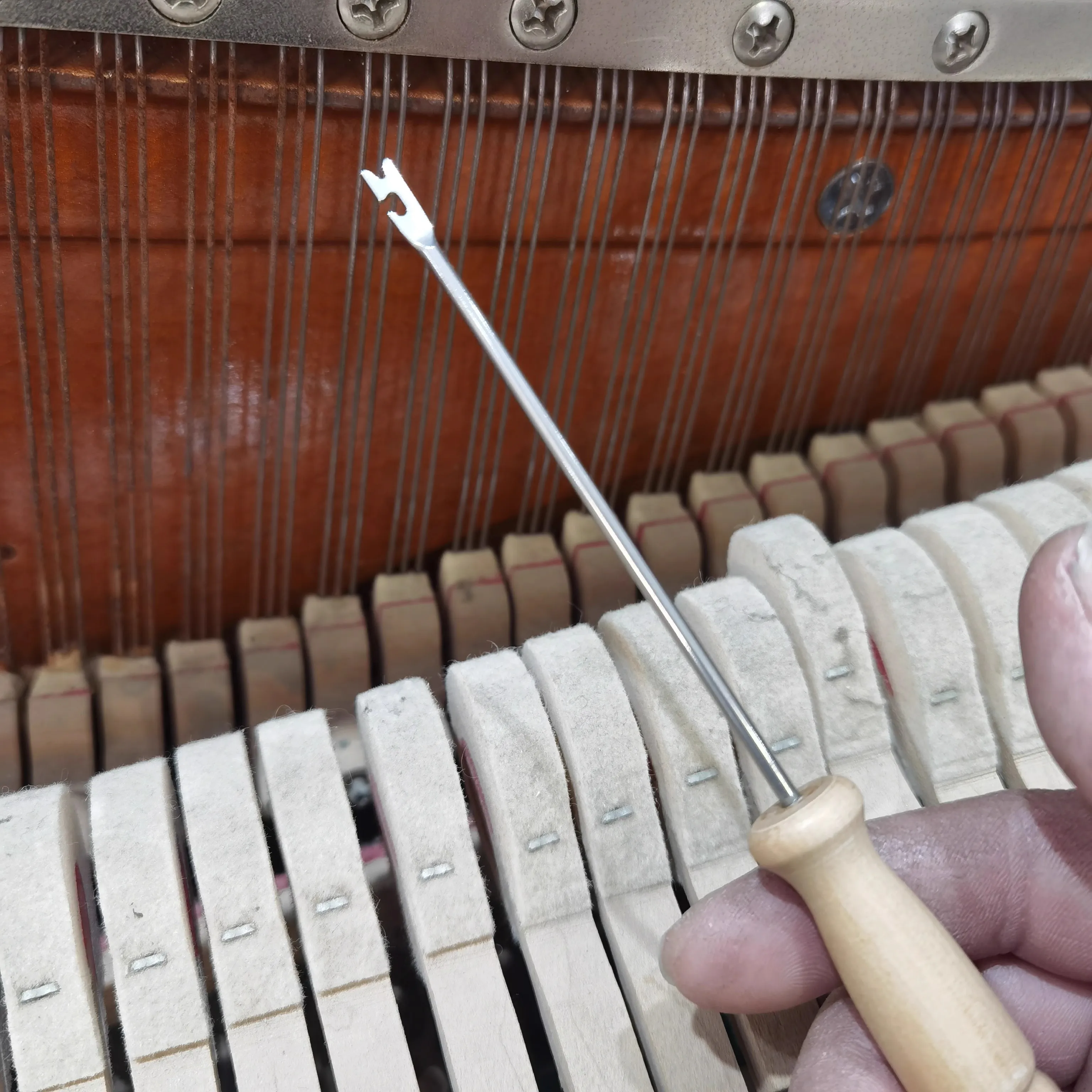 

Инструмент для вытягивания струн/пианозвука фортепиано