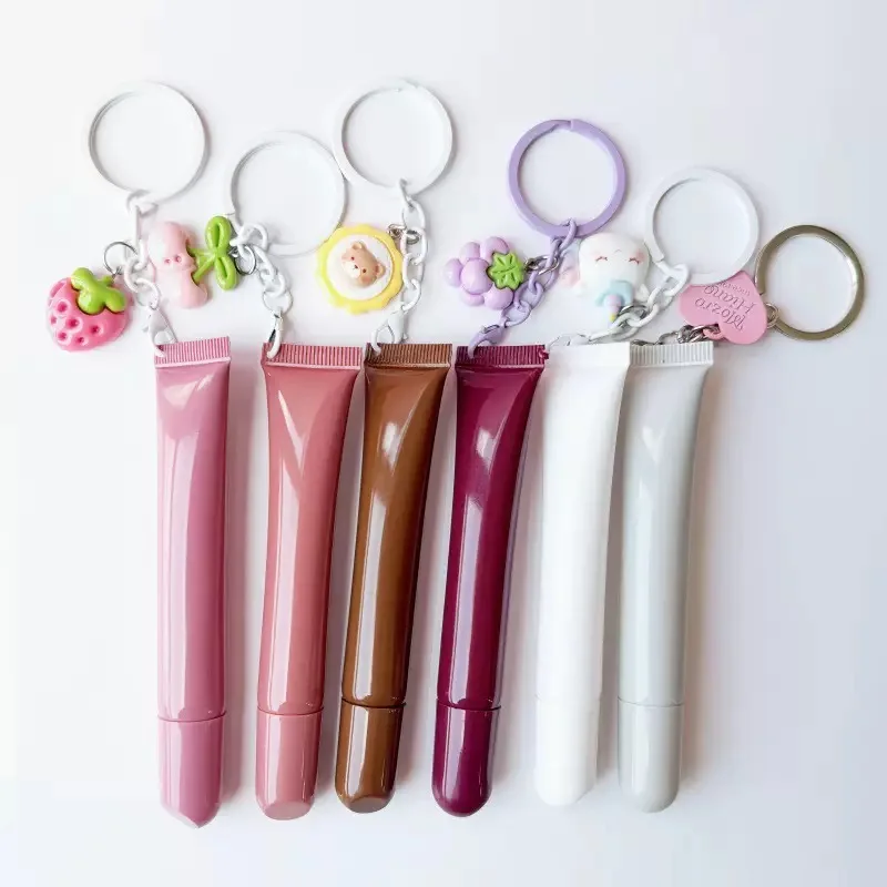 

50Pcs Empty Pink White Plastic Lip Gloss Squeeze Bottle Cream Lotion 10ml Soft Lip Balm Squeeze Container Tube with Keychain