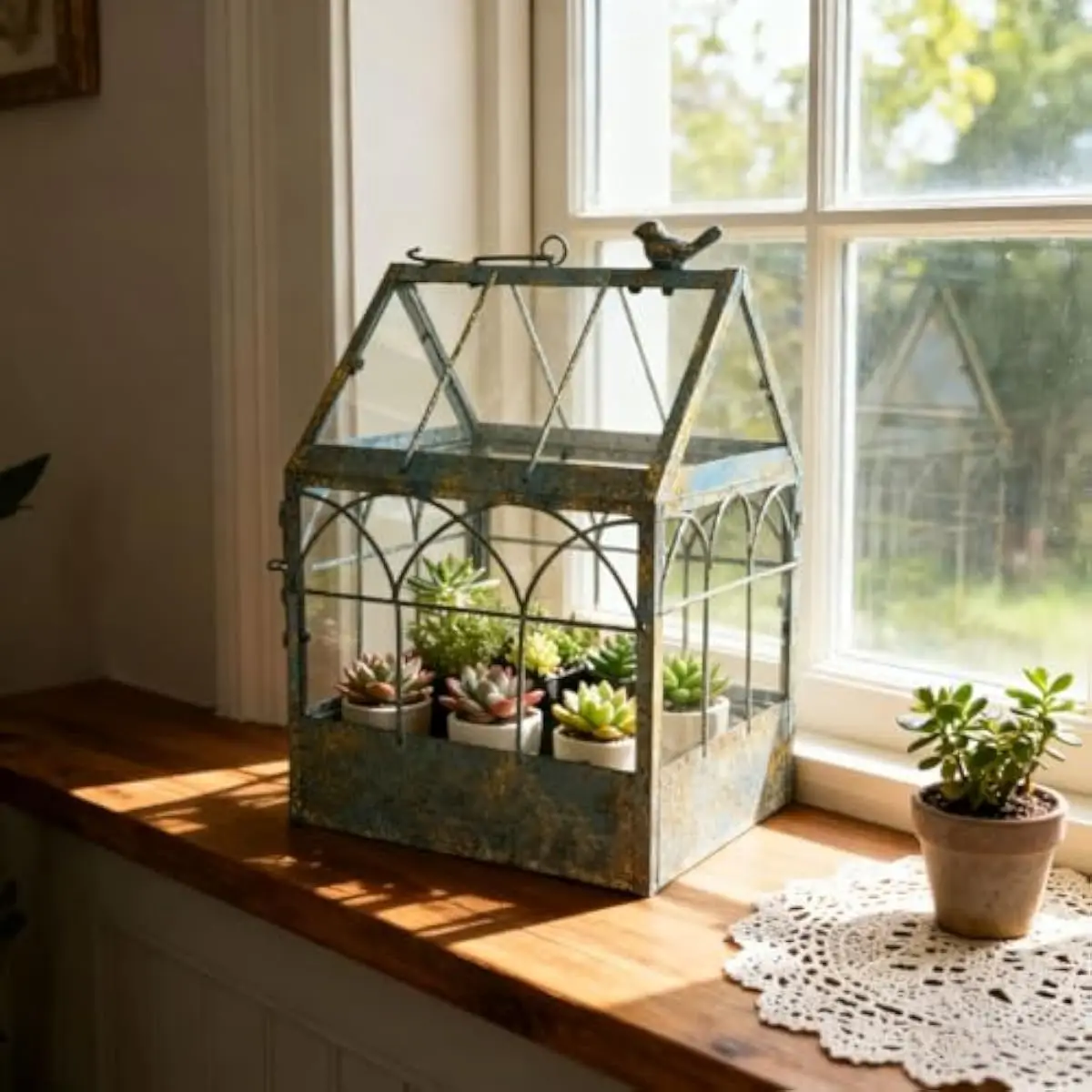 Rustic Metal Mini Greenhouse with Arched Windows and Sloped Roof Featuring Weathered Finish Bird Ornament Transparent Glass Encl