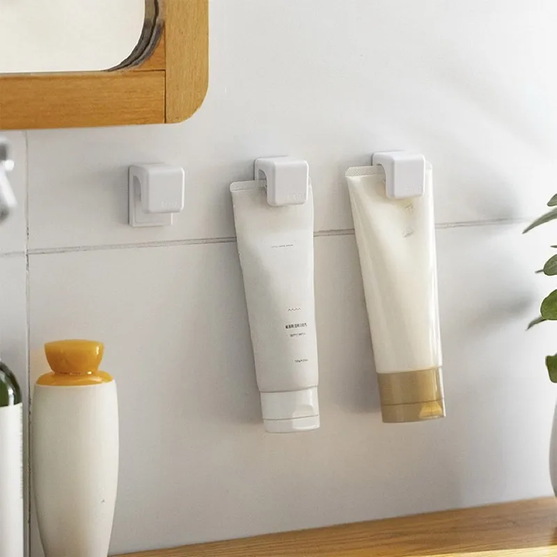 Toothpaste Holder and Facial Cleanser Wall Rack Wall Mount Bathroom Storage Rack For Household Use No Punching Toothpaste Clip