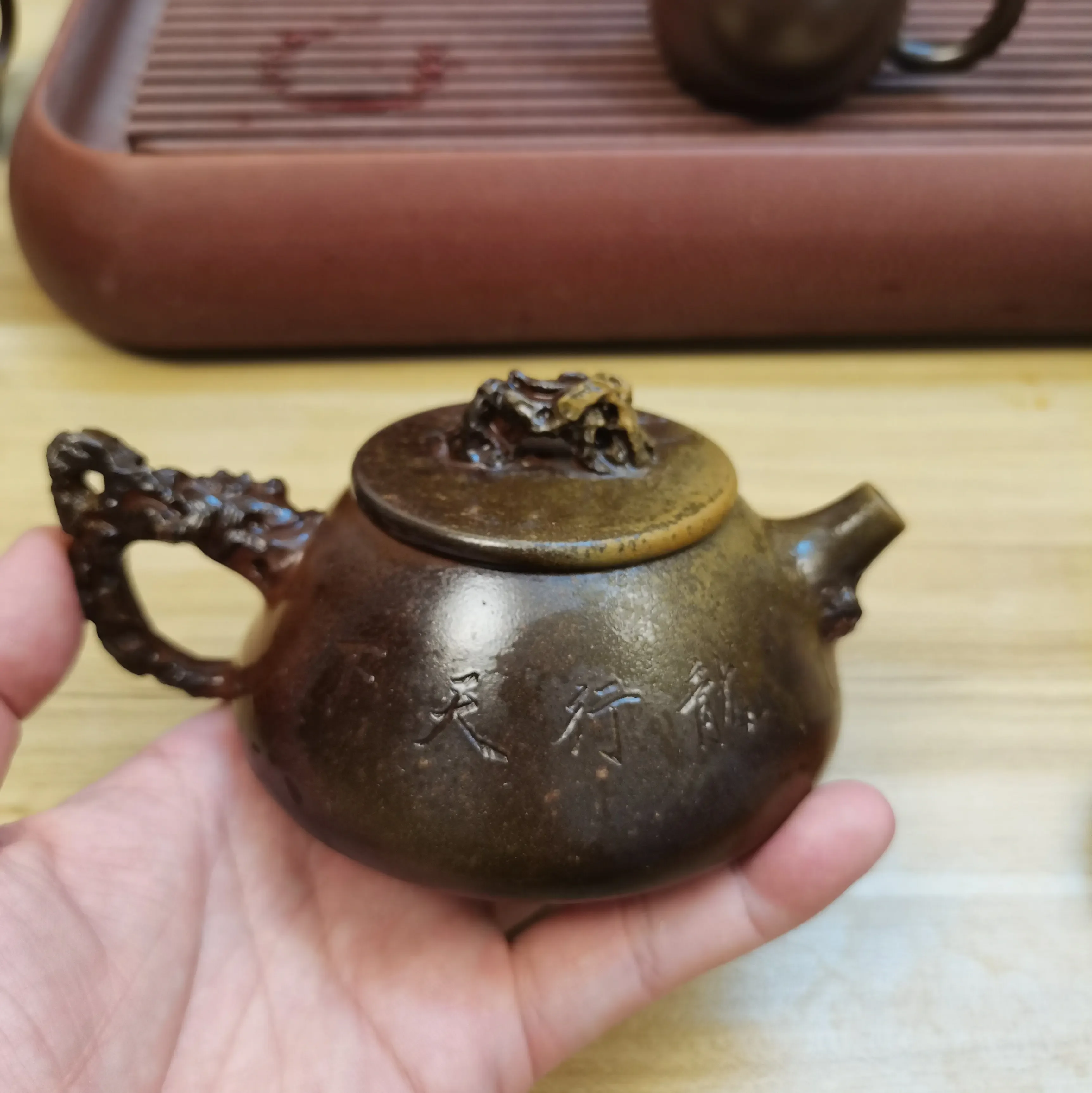 Qinzhou Nixing pottery teapot bionic stone scoop pure hand-carved relief dragon pot large-capacity firewood burning boutique