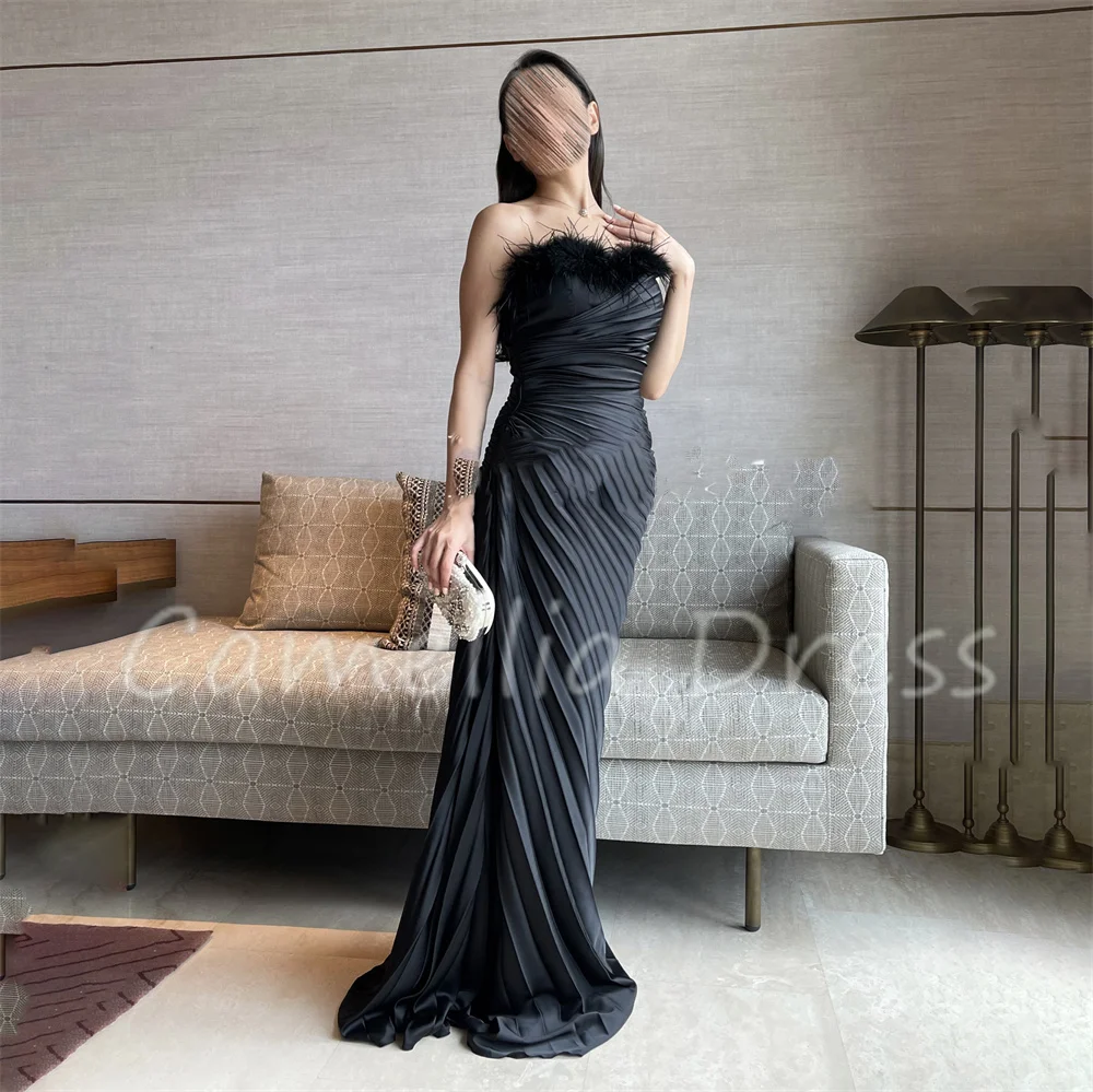 

Black Sheath Evening Dresses Boat Neck Pleated Party Dresses Luxurious Feather Formal Dresses Vestidos De Fiesta فساتين السهرة