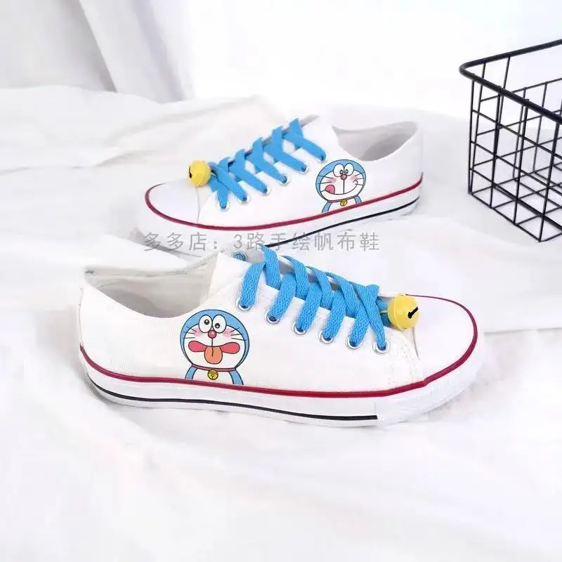 

Doraemon real pictures low top man's plus size white 2025 new spring Canvas shoes Casual drop shipping women's skate shoes