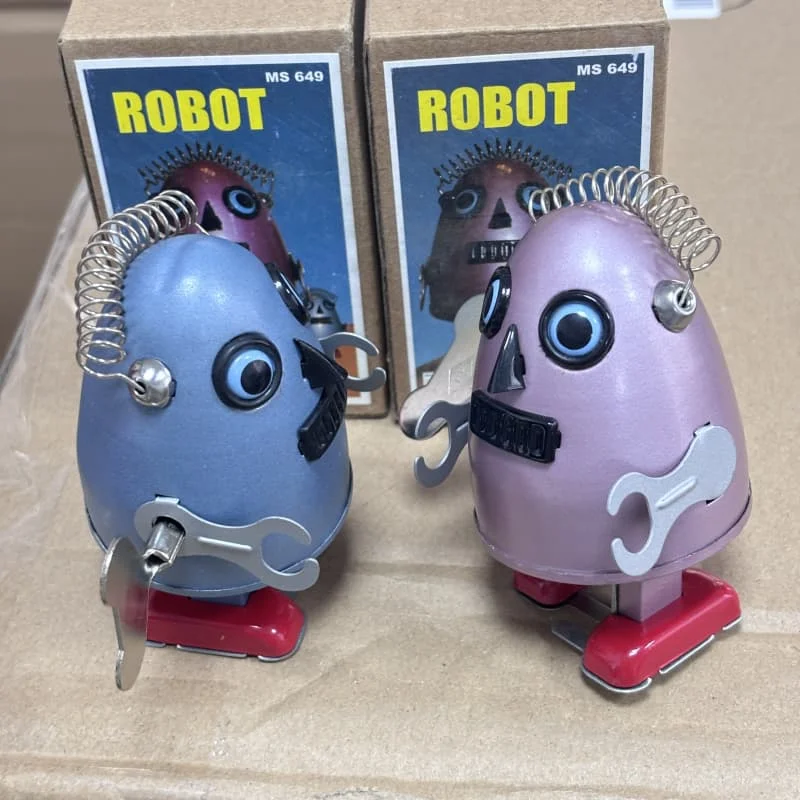 

Clockwork Toy Collection Retro Metal Tin Space Egg Alien Egg-shaped Robots Mechanical Wind Up Toy Figure Gift