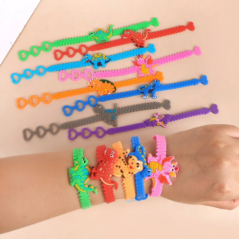 12-36 Uds. Pulseras de dinosaurios de dibujos animados para niños, recuerdos de fiesta de cumpleaños, relleno de piñata, regalo para invitados, suministros de decoración para fiesta de dinosaurio