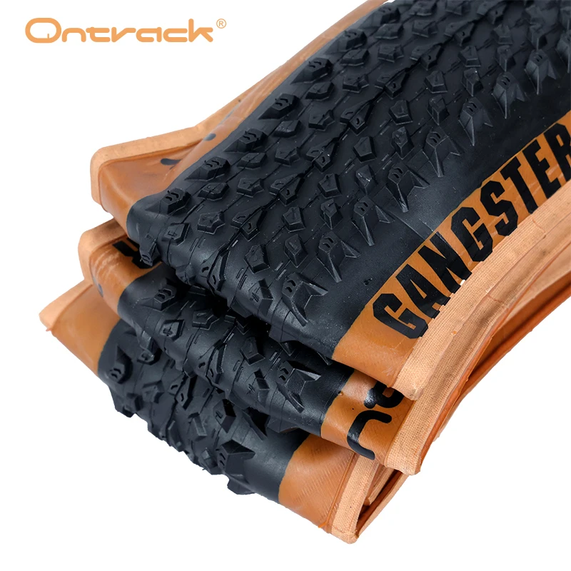 

Велосипедная шина ONTRACK TIRE GANGSTER 29X2.20 MTB 60TPI Kevlar, складная, полностью черная, с коричневой стенкой