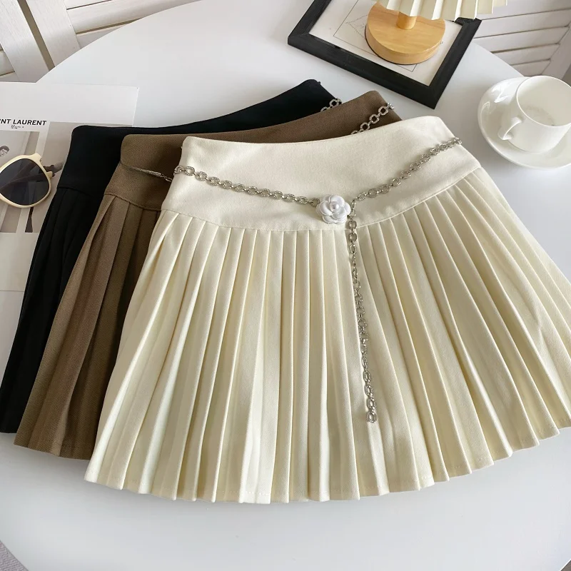 กระโปรงลายสก๊อตเอวสูงสำหรับผู้หญิง ฤดูใบไม้ร่วง ฤดูหนาว 2023 ดีไซน์ใหม่ลายดอกไม้พร้อมโซ่ กระโปรงทรงเอเข้ารูป ดีไซน์หรูหรา