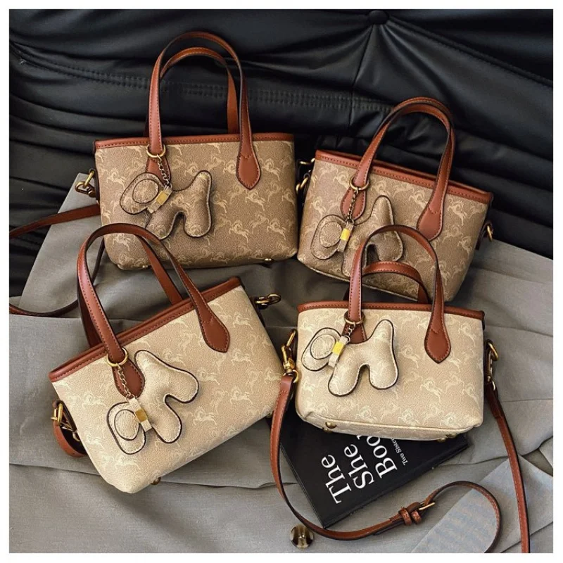 Bolsa tote feminina de camada superior feita de couro de vaca com moda malta vintage leve e macia estilo diário