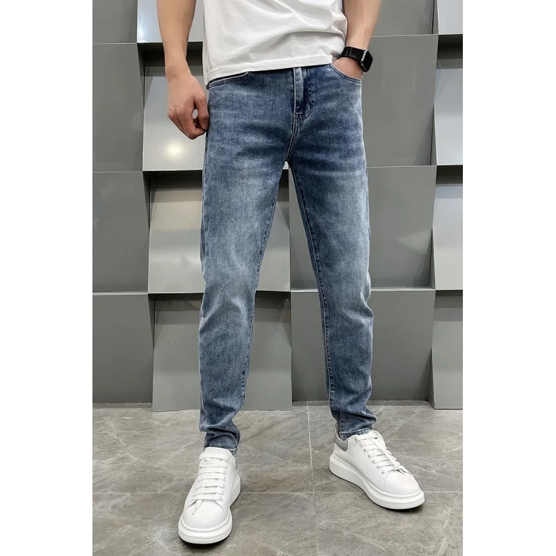 High-end light luxury printing men\'s jeans loose straight pants spring and summer models casual versatile light blue men\'s pants