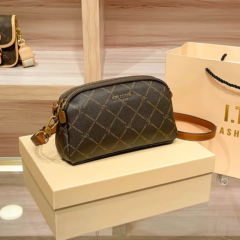 

Модная дизайнерская сумка для подгузников для женщин, сумка через плечо, люксовый бренд, минималистичная, элегантная, вместительная кожаная сумка-тоут