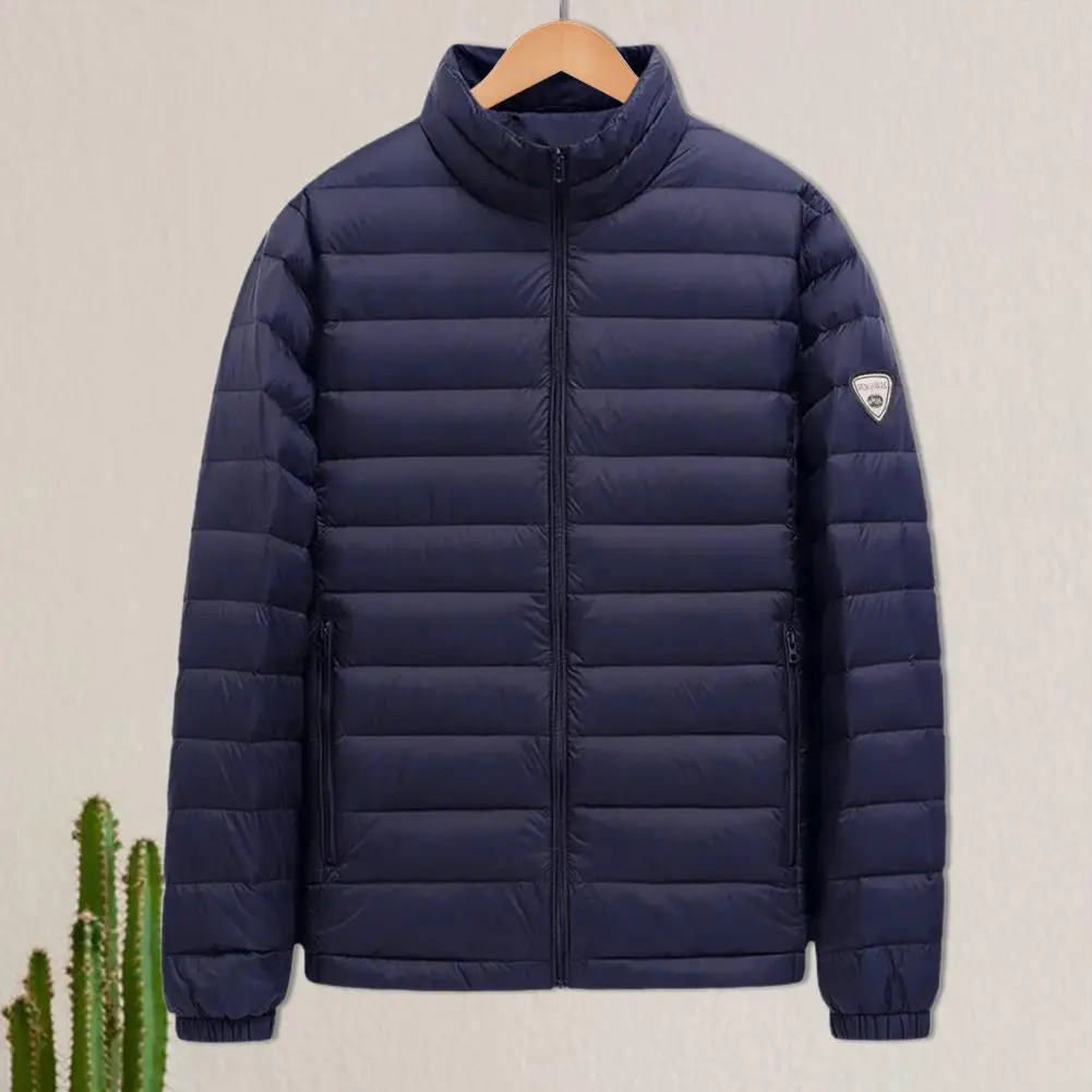 Abrigo de algodón para hombre, chaqueta acolchada de color sólido de manga larga con cuello levantado y bolsillos, prendas de vestir cortas ligeras de invierno