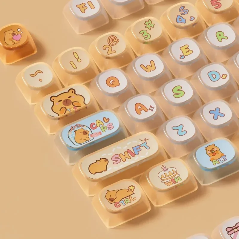 

Capybara Pudding Keycap MOA Profile 140 Keys PBT PC Material Four-sided Translucent Yellow Cute Keycaps for Mechanical Keyboard