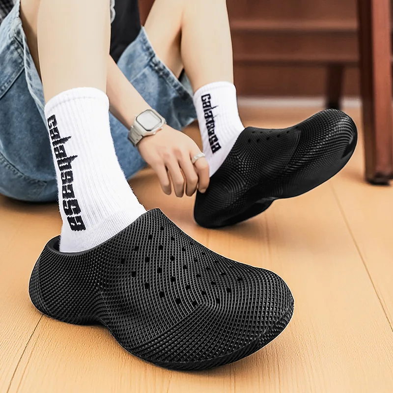 Fashion solid bag head hole shoes couple with the same summer wear 3D stepping on shit feeling thick-soled beach cool slippers