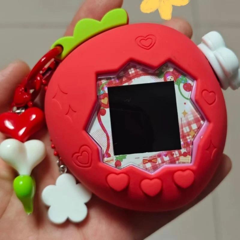 لعبة Tamagotchi Smart Paradise Pet Toy علبة الفراولة الوردية مع ورق لوحة وسلسلة مفاتيح - آلة الحيوانات الأليفة الرقمية لألعاب الأطفال