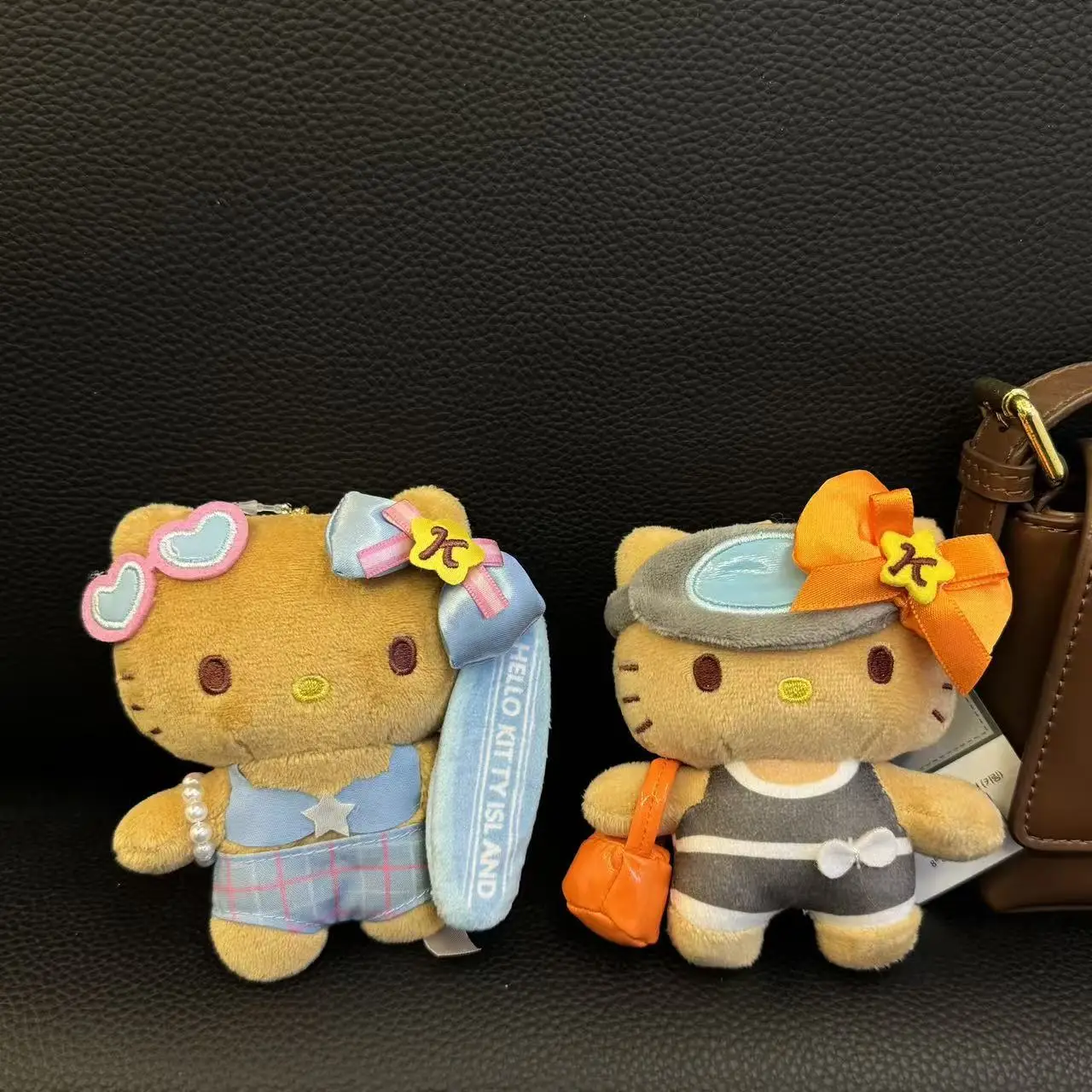 

Island series Blue Hello Kitty Keychains Surfboard Black Leather Plush doll Keychains School Bag Hanging Cartoon bag Pendant