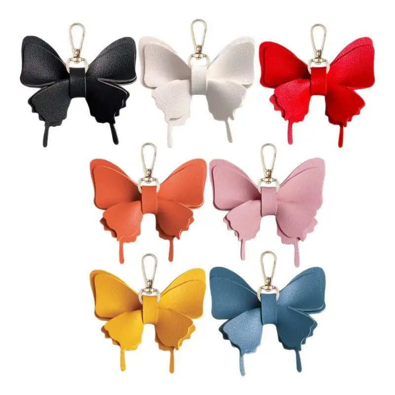 Schmetterlings-Schlüsselanhänger aus PU-Leder mit leuchtenden Farben und robustem Metallverschluss, perfekt zum Dekorieren von Rucksäcken und Handtaschen. – Detail 9