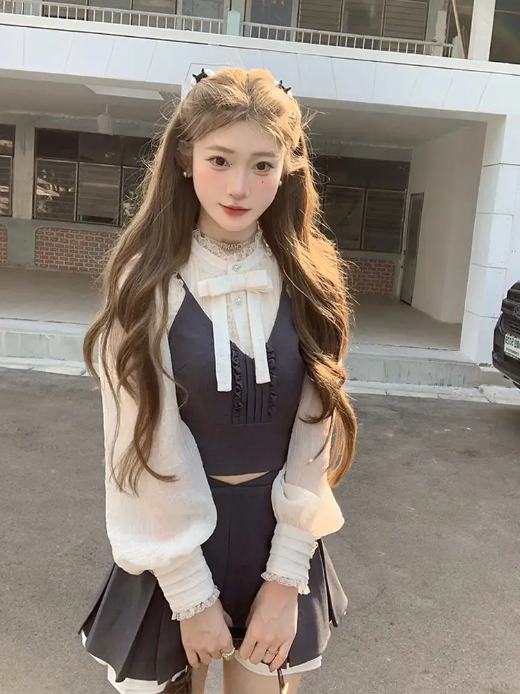 Korean Three Piece Set Bow Lantern Sleeve Shirt+Solid Color Suspender Vest+High Waist Slimming A-Line Pleated Skirt Set Of Three