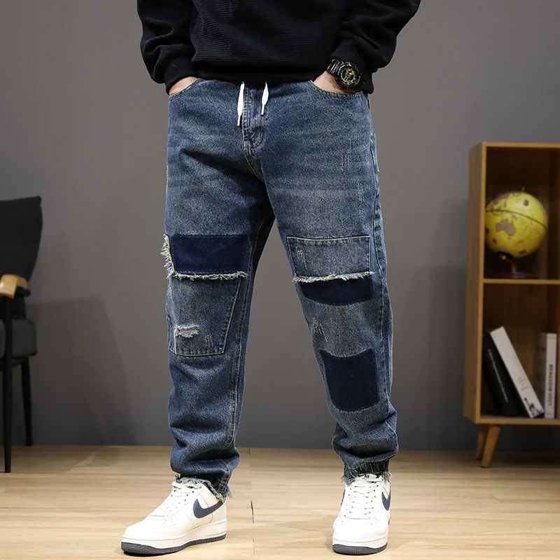 عداء ببطء الجينز الرجال الدنيم السراويل حجم كبير 8XL موضة المرقعة الجينز عادية مرونة الخصر الدنيم السراويل الذكور سراويل كبيرة الحجم