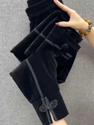 2024 autumn and winter new retro buckle nine point velvet women's pants Korean version high waisted versatile harem pants trend