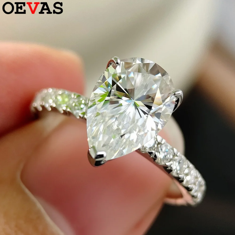 

Кольцо OEVAS 2CT с муассанитом грушевидной огранки 7x10 мм для женщин, серебро S925, обручальное кольцо, цвет D, проходит тест на алмазный тестер, изысканные свадебные украшения