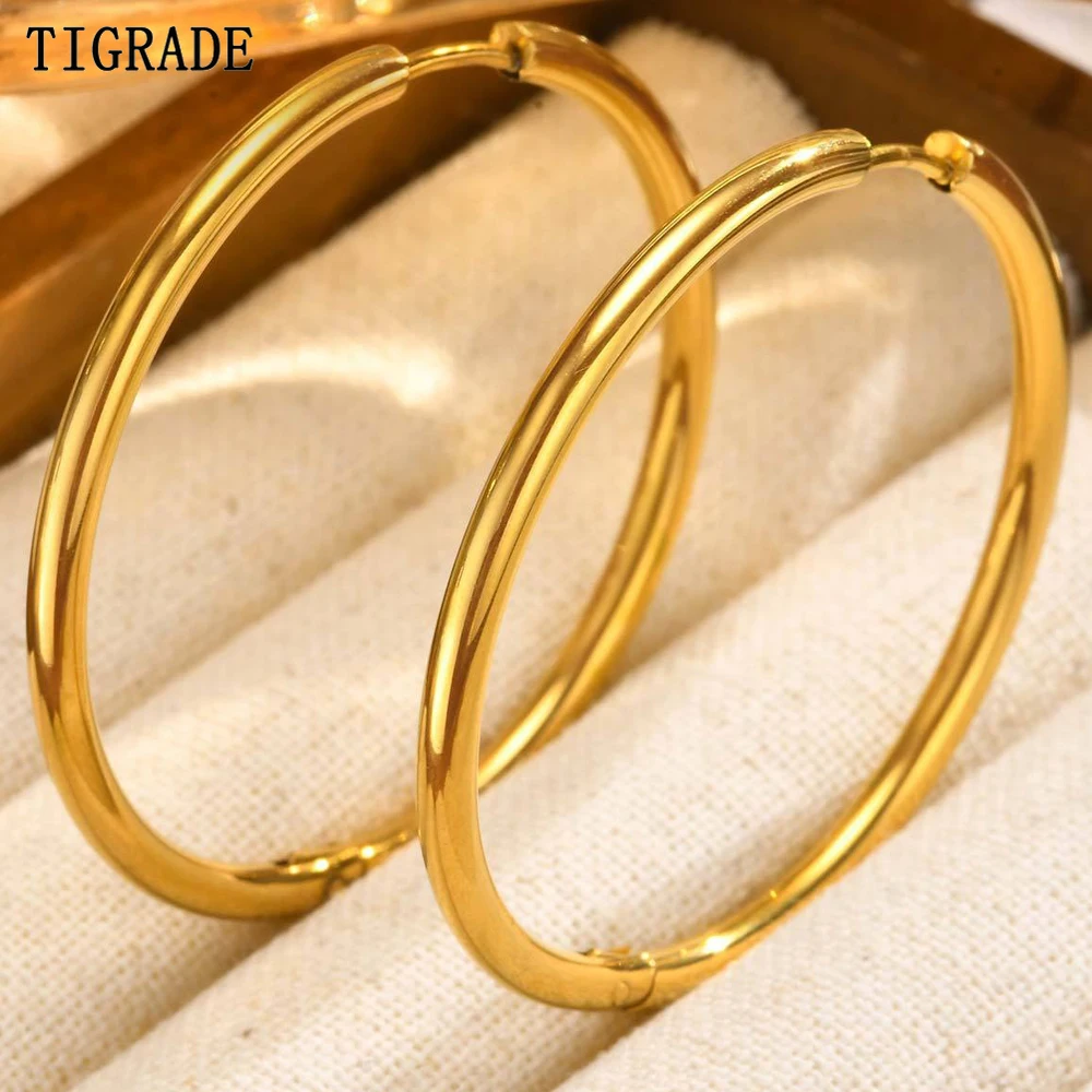 Tigrade nuevo pendiente de aro redondo de acero inoxidable para mujeres y hombres pendientes Huggie minimalistas chapados en oro joyería de boda regalos de fiesta