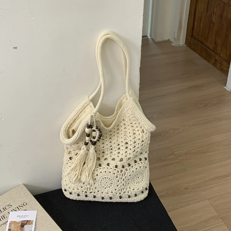 Women Woven Straw Tote Bag Large Capacity Hollow Crochet Shoulder Bag Bohemian Style Beach Bag with Tassel for Summer Vacation
