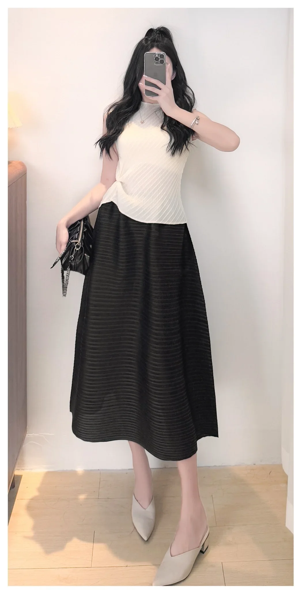 Doble Miyake plisada media falda de mujer 2025 primavera nuevo Horizontal minimalista Color sólido falda de diseño suelto 2025 novedad de verano