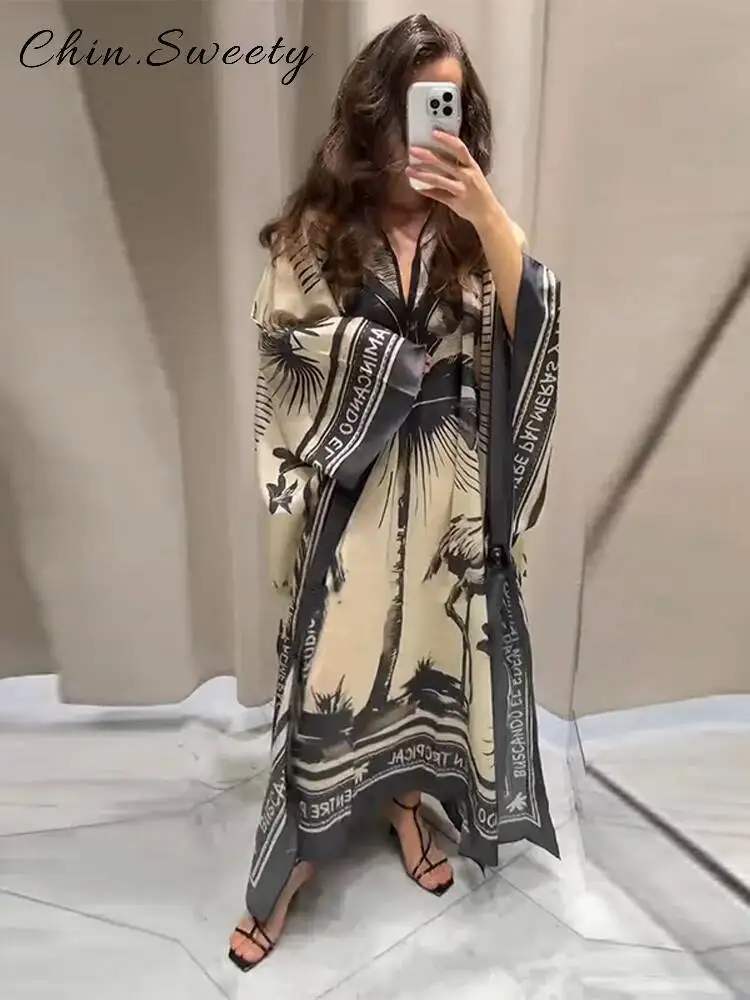 فستان أنيق مطبوع طويل مطوي للنساء فضفاض برقبة دائرية وأكمام طويلة فساتين الحفلات 2025 صيفي للسيدات لقضاء العطلات على الشاطئ جديد