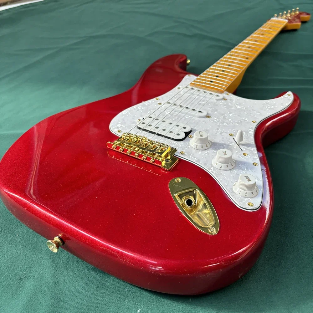 

Metallic Red Guitar - Gloss finish, maple neck, humbucker pickups, 24 frets, locking tuners, balanced tone, easy to play