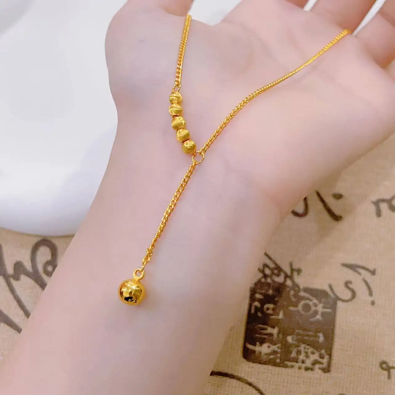 9999 Gold Rattled Cat-Eye Flowing Tassel Y-Shape Necklace for Women - Court Style, High-Class Lockbone Chain
