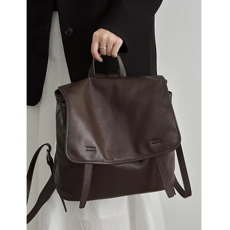 Mochila de piel de vaca curtida vegetal 2026, mochila minimalista Retro de cuero genuino, bolso de viaje informal de gran capacidad para mujer